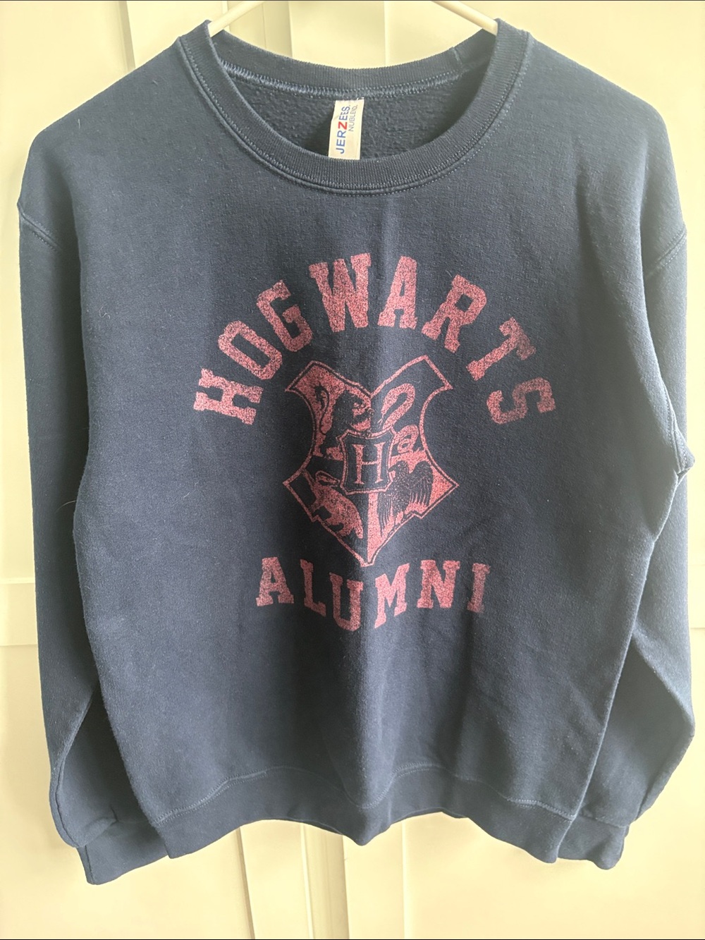 Jerzees Navy Sweatshirt with Pink Hogwarts Alumni Graphic